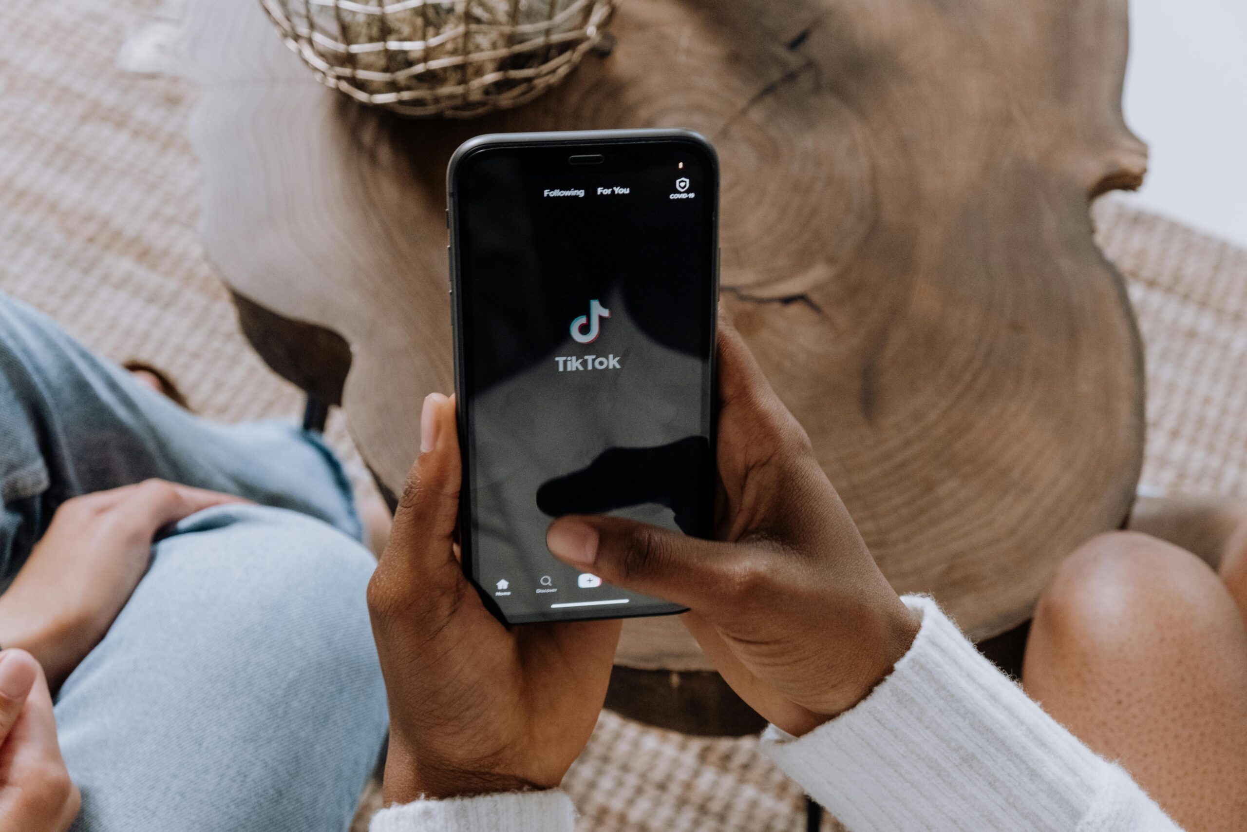 User saving their TikTok video to back up content before potential app bans