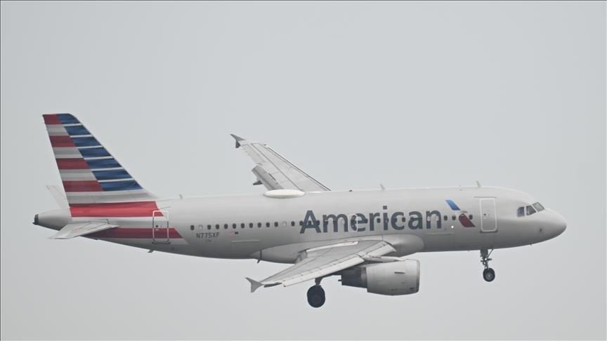 American Airlines flight board showing cancellations due to technical glitch"